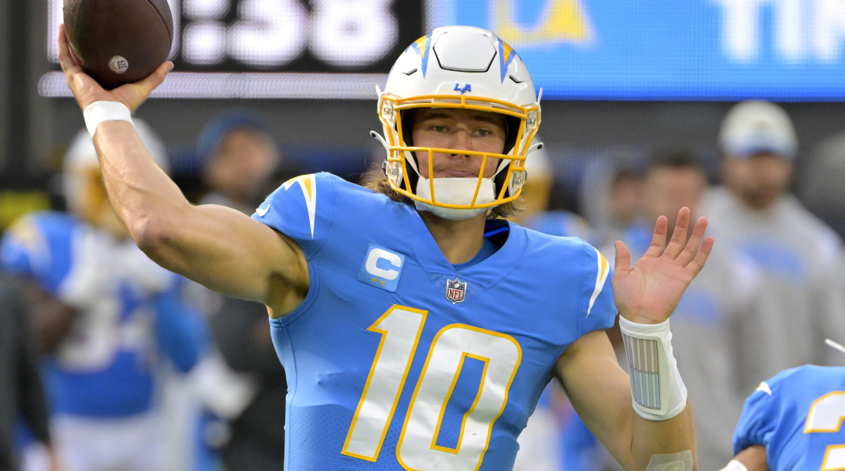 Chargers quarterback Justin Herbert passes the ball